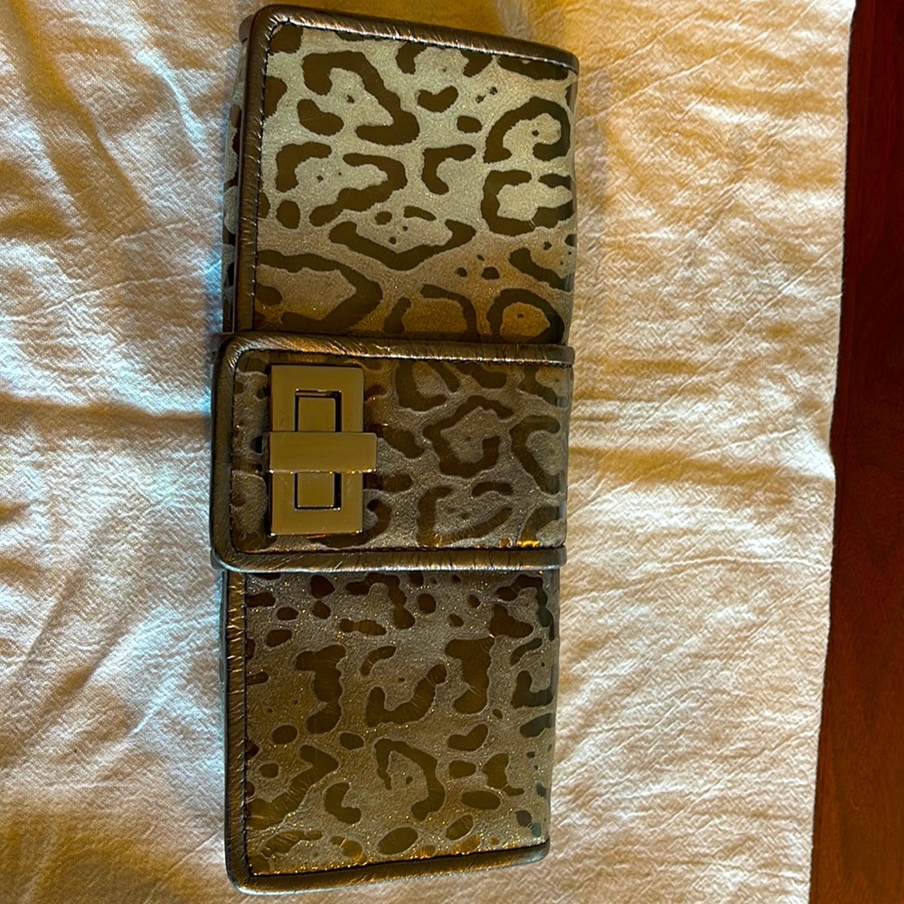 Kooba animal print embossed silver clutch